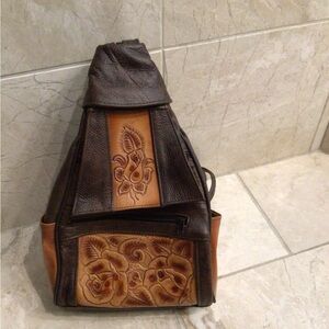 New;never used Genuine brown/tan  Leather backpack